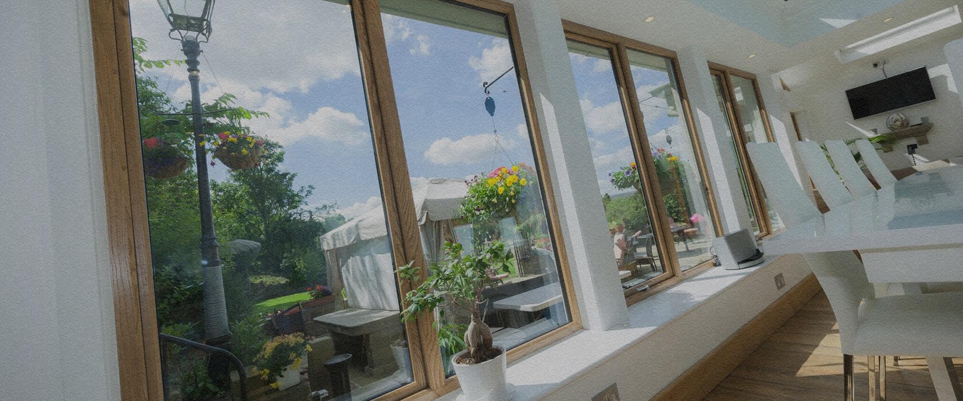 Opus aluminium clad timber windows in a bright open plan room