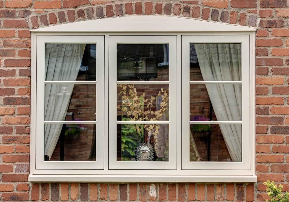 Flush sash window sitting level with its frame