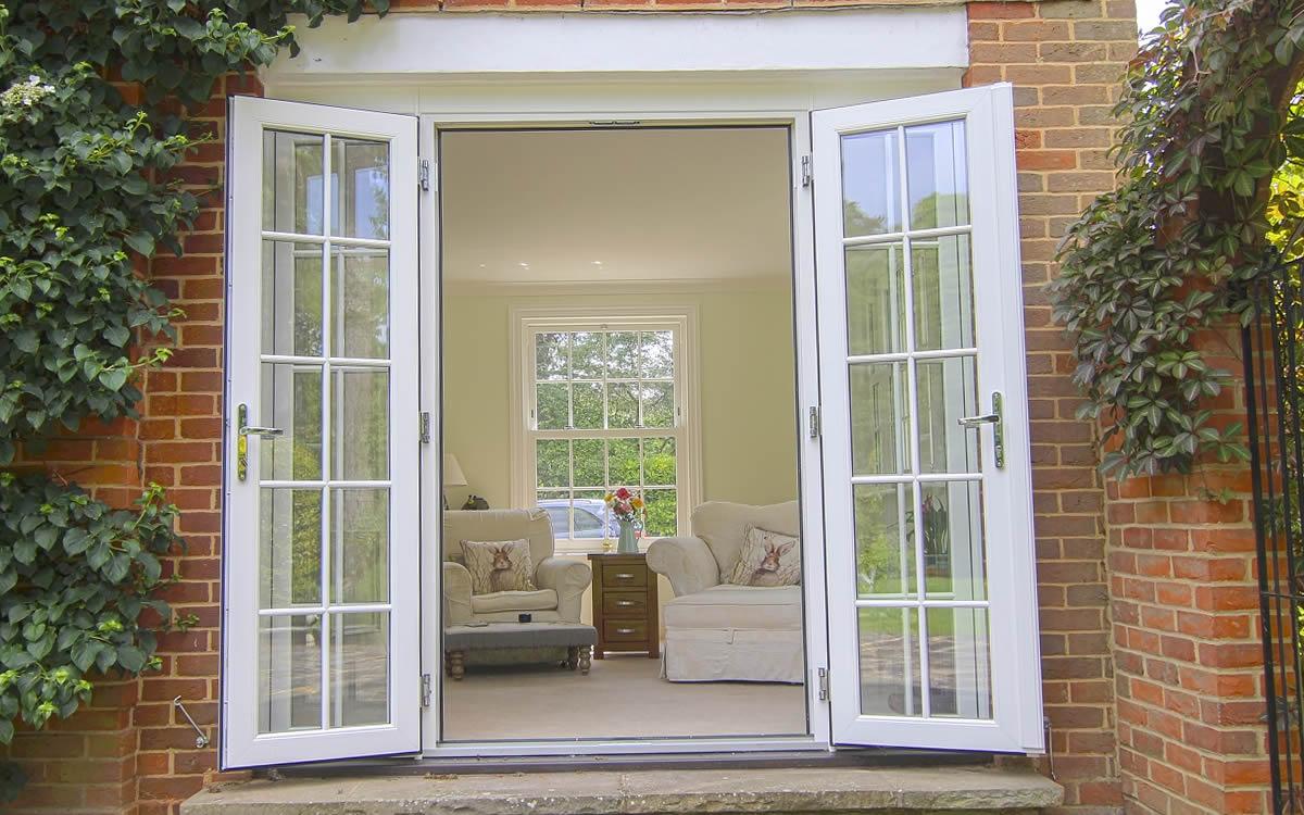 White uPVC residential back door with obscured glazing