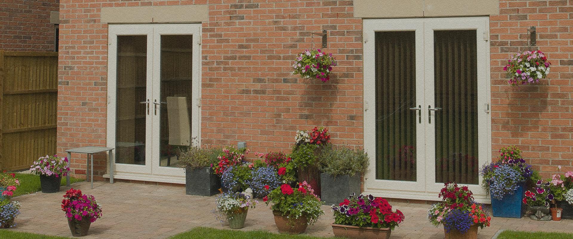 White uPVC residential door with obscured glazing