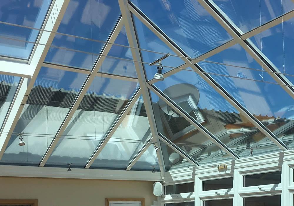 Rain beading and running clear off self cleaning glass