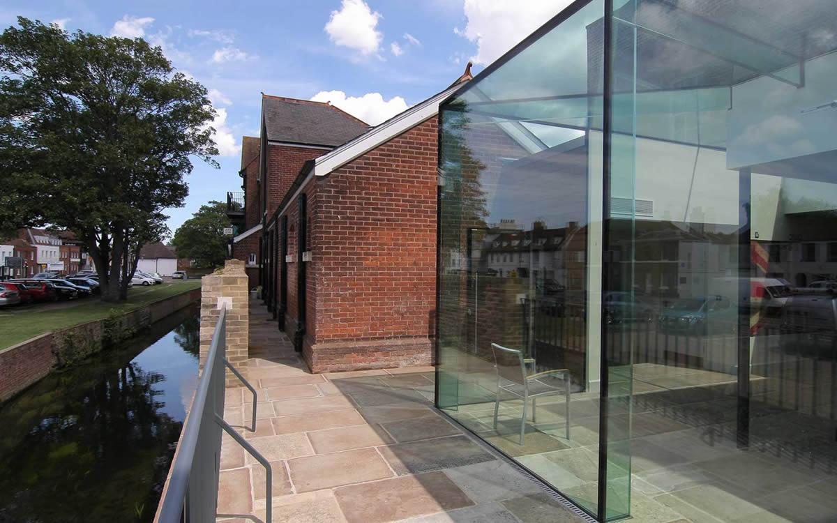 Close-up of a slim framed glass panel with a clean sightline