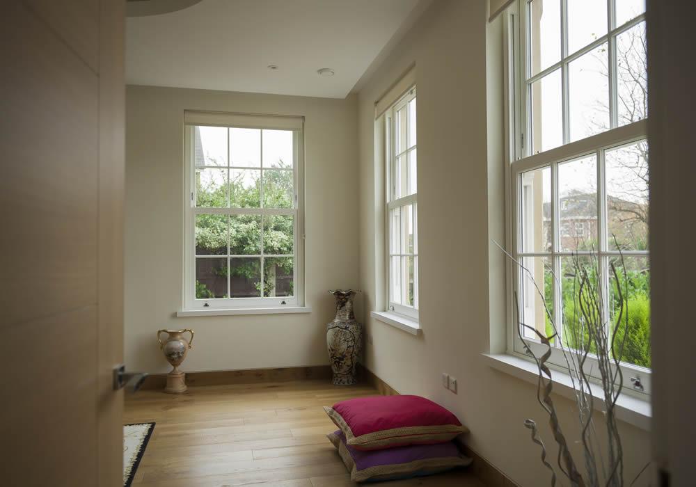 White vertical sliding sash windows on a period house